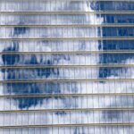 white and blue window blinds